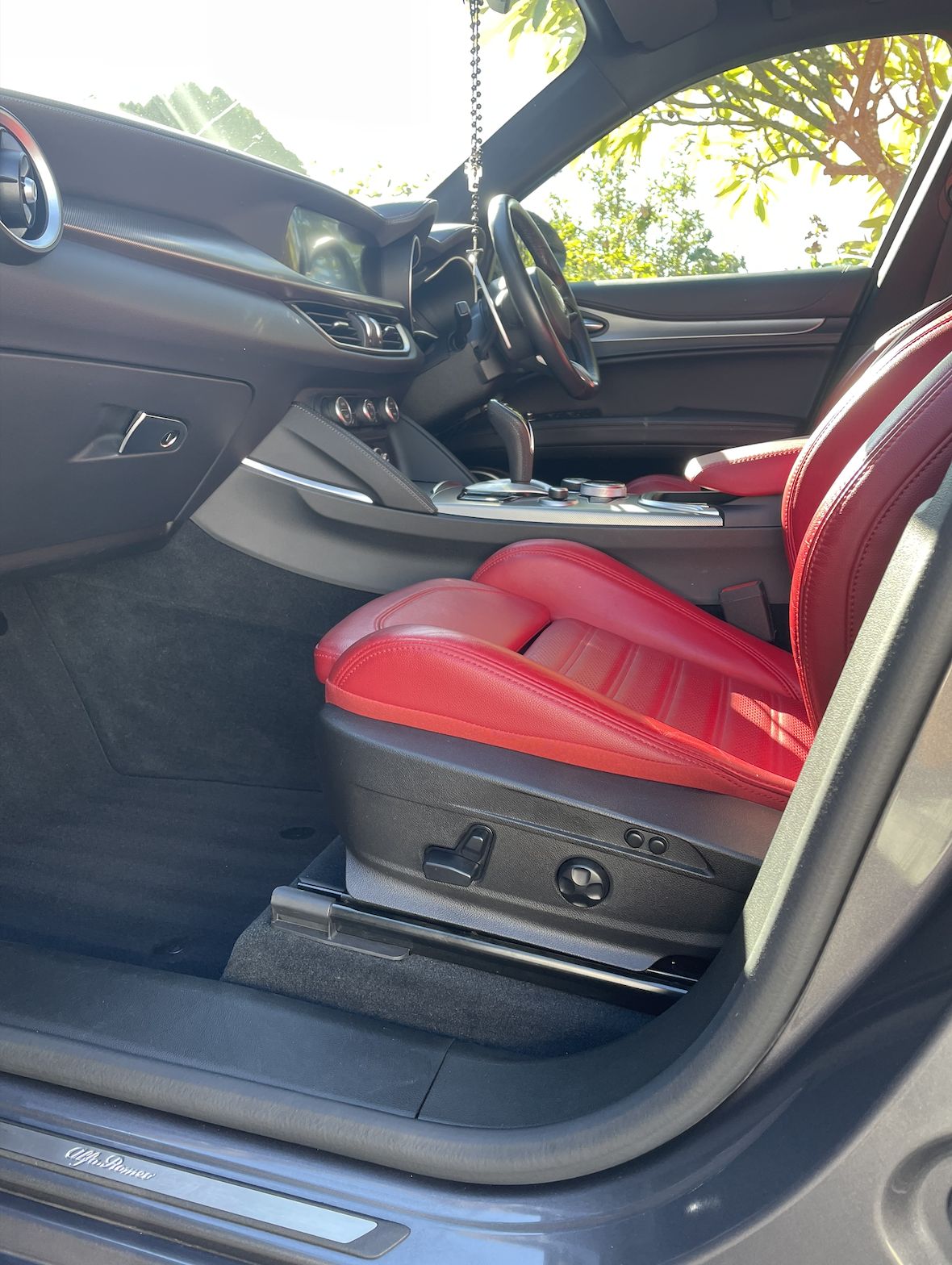 Red leather seats cleaned and conditioned